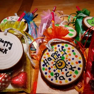 Photo of cakes, party hats and other celebratory paraphernalia