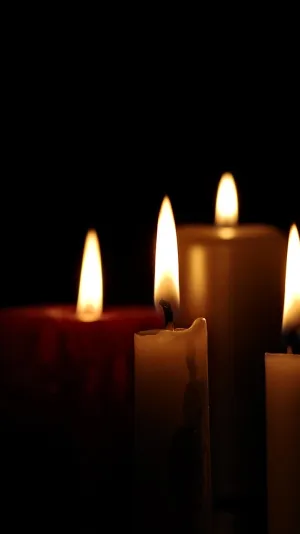 Photo of a group of lit candles
